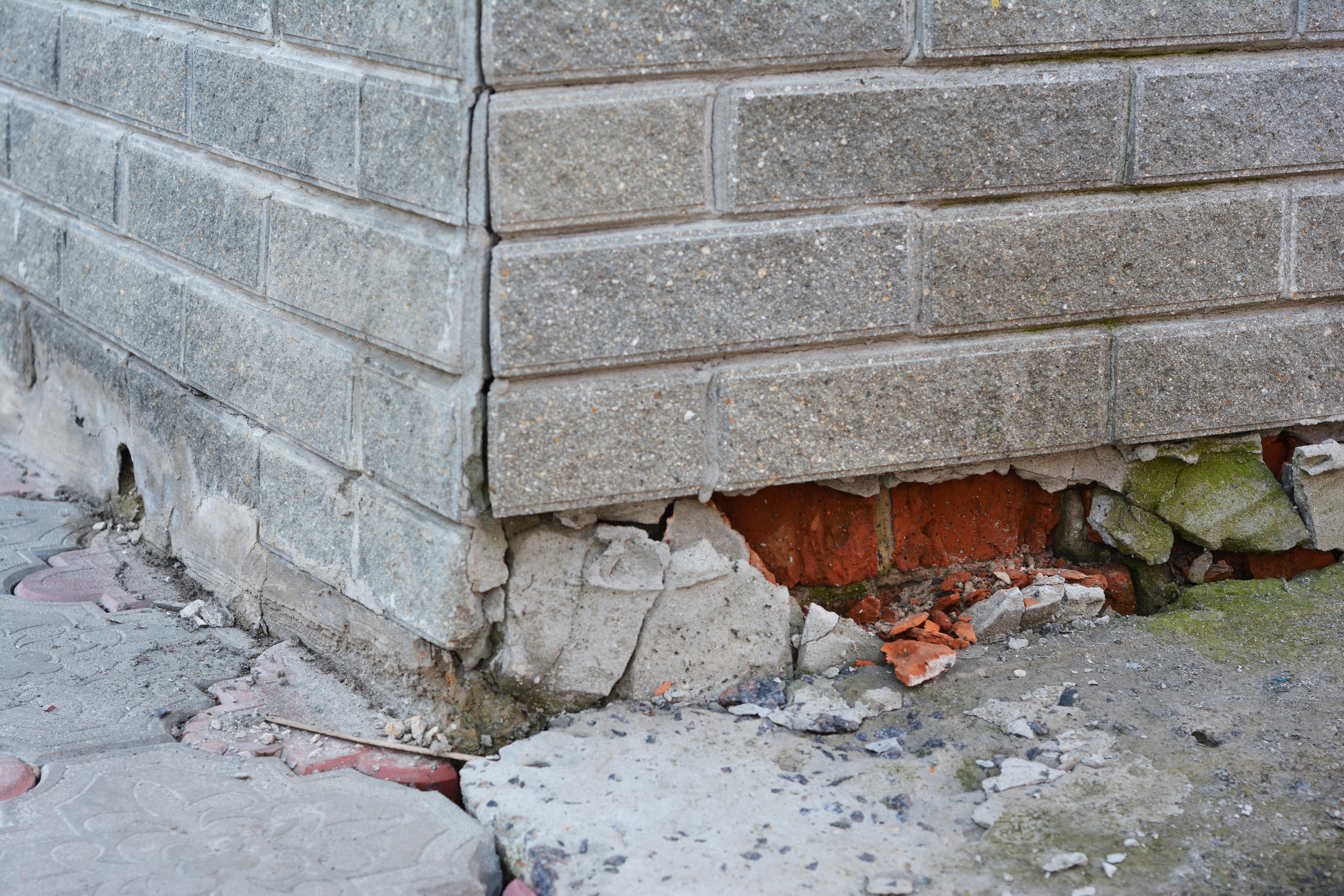 Broken brick on home in need of foundation repair