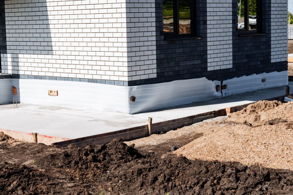 Detailed closeup of the slab foundation of a home